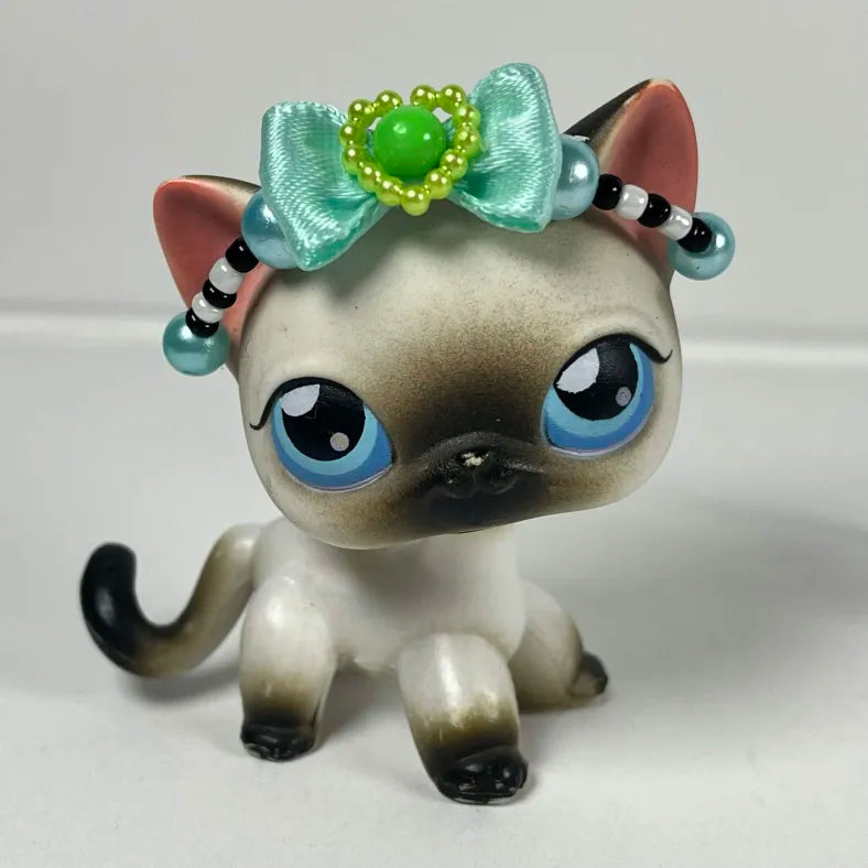Blue, black, white, and green LPS crown