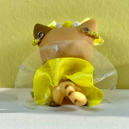 Tenue LPS jaune or et blanche